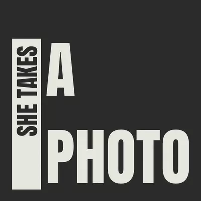 She Takes A Photo
