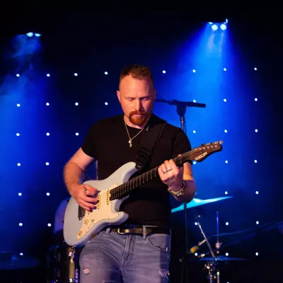 Tuned In Guitar Lessons