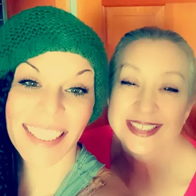 2 Moms, a broom and a prayer.